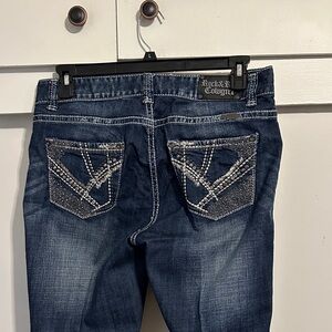 Rock & Roll Cowgirl  34x34 Dark Blue Boot Cut Jeans with Embellished Pockets